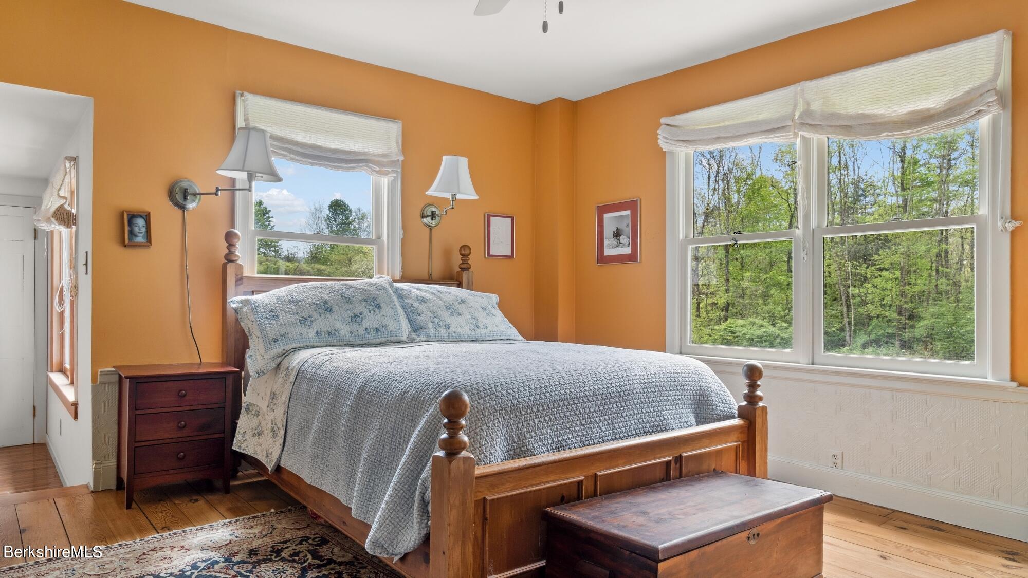 25 Cross Road West Stockbridge, MA 01266 - Photo 21 of 44 a bedroom with a bed and wooden floor