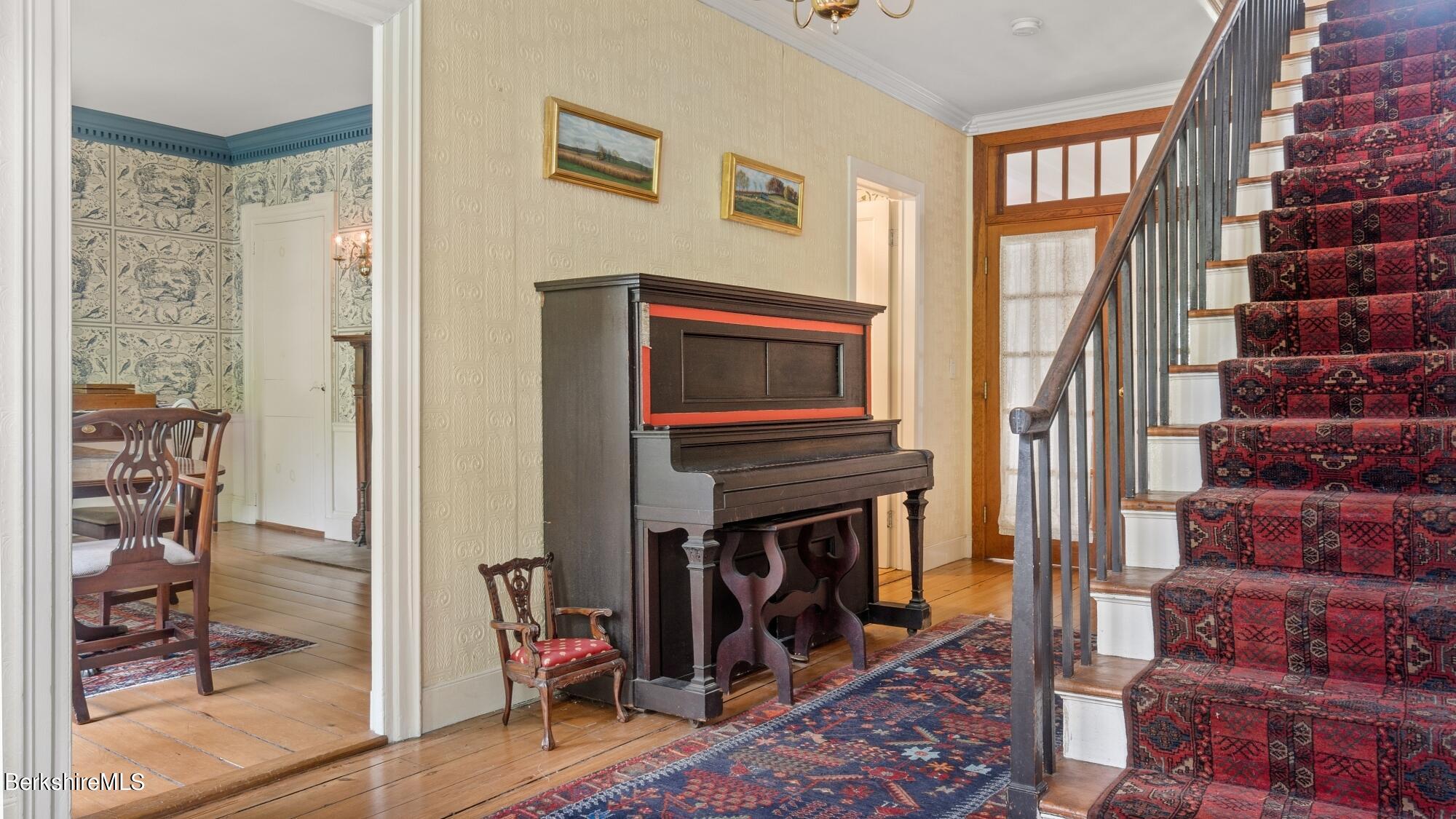 25 Cross Road West Stockbridge, MA 01266 - Photo 8 of 44 a living room with furniture a flat screen tv and a fireplace