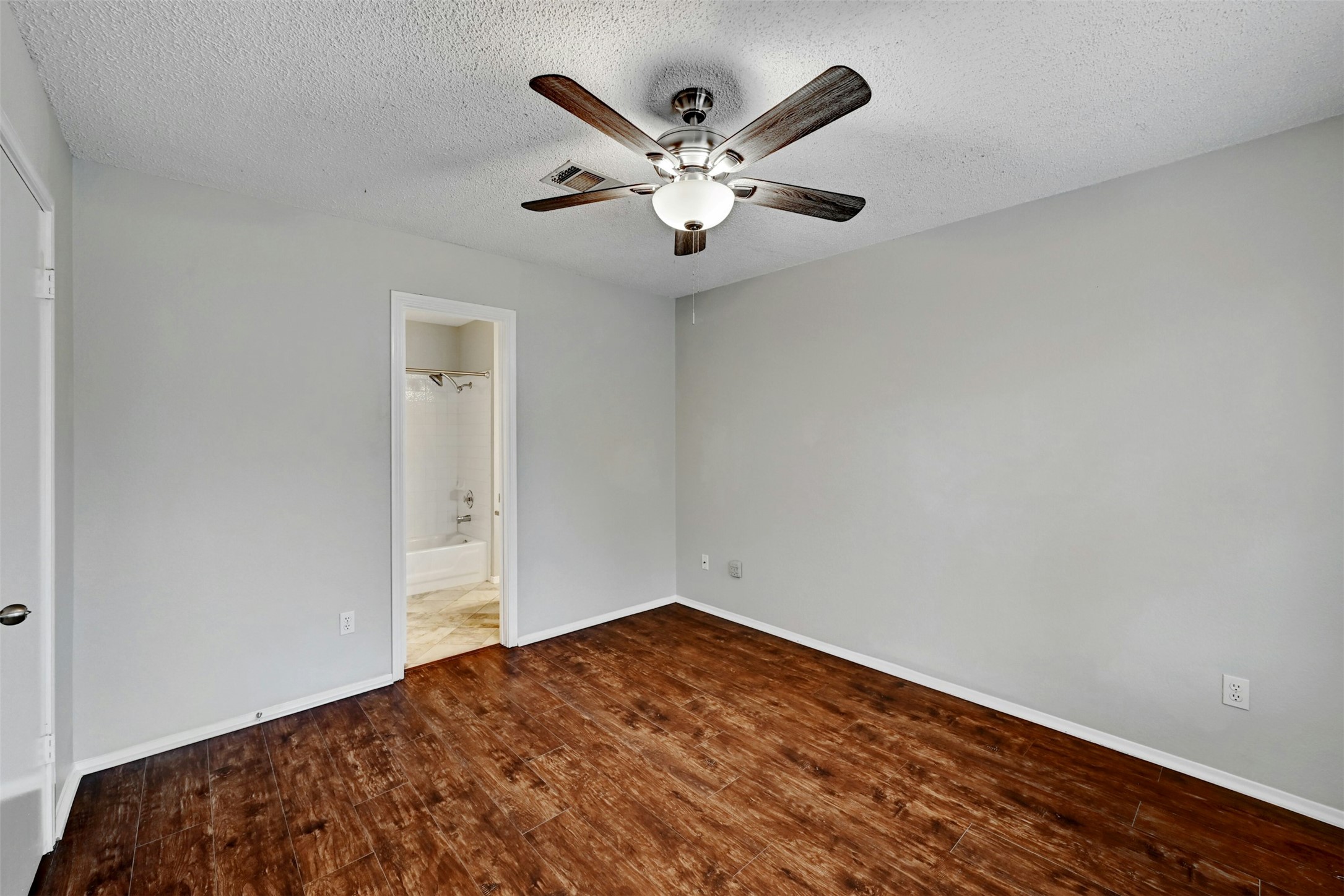 1807 Hollow Tree Boulevard Round Rock, TX 78681 - Photo 23 of 40 a view of empty room with wooden floor