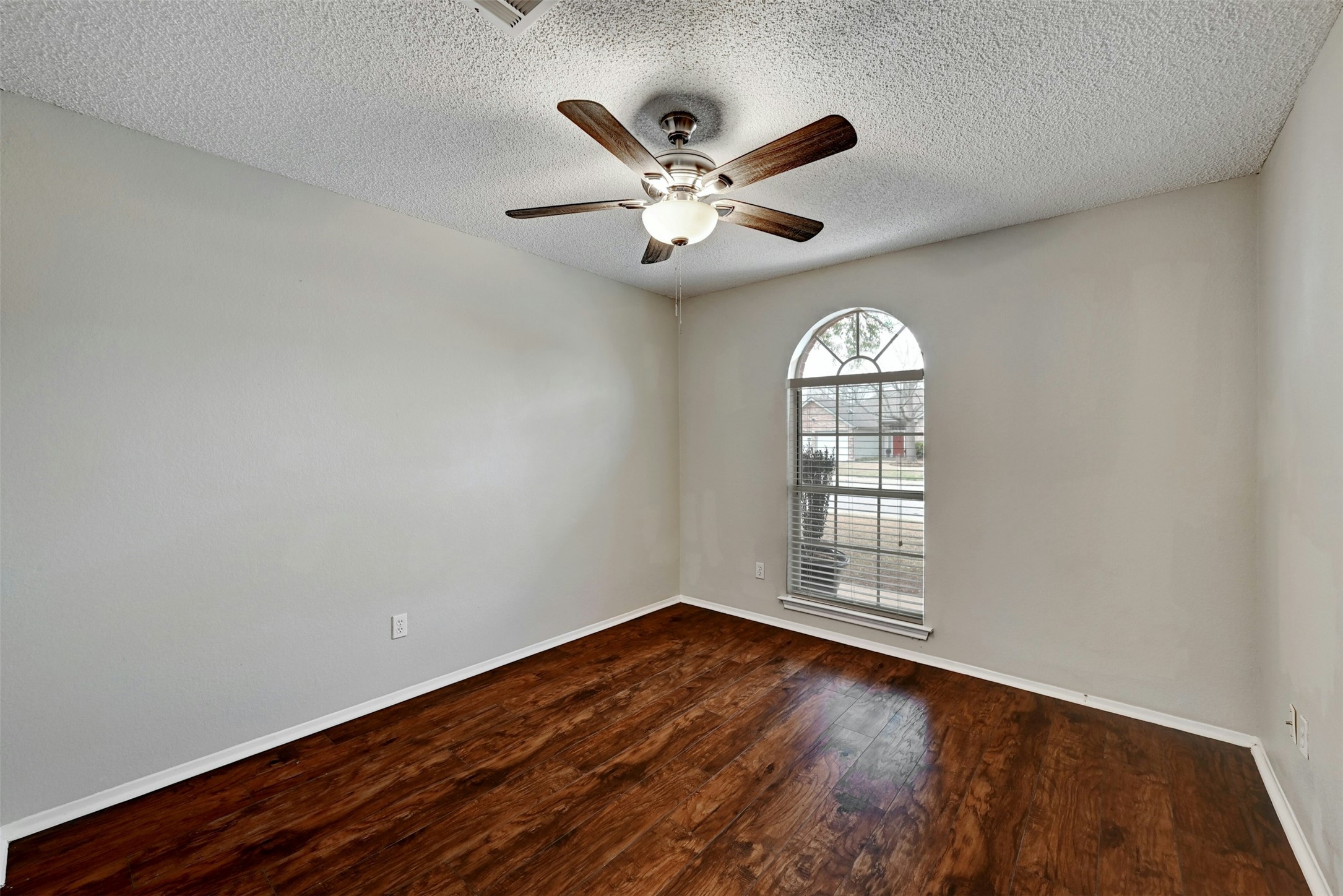 1807 Hollow Tree Boulevard Round Rock, TX 78681 - Photo 27 of 40 wooden floor in an empty room with a window