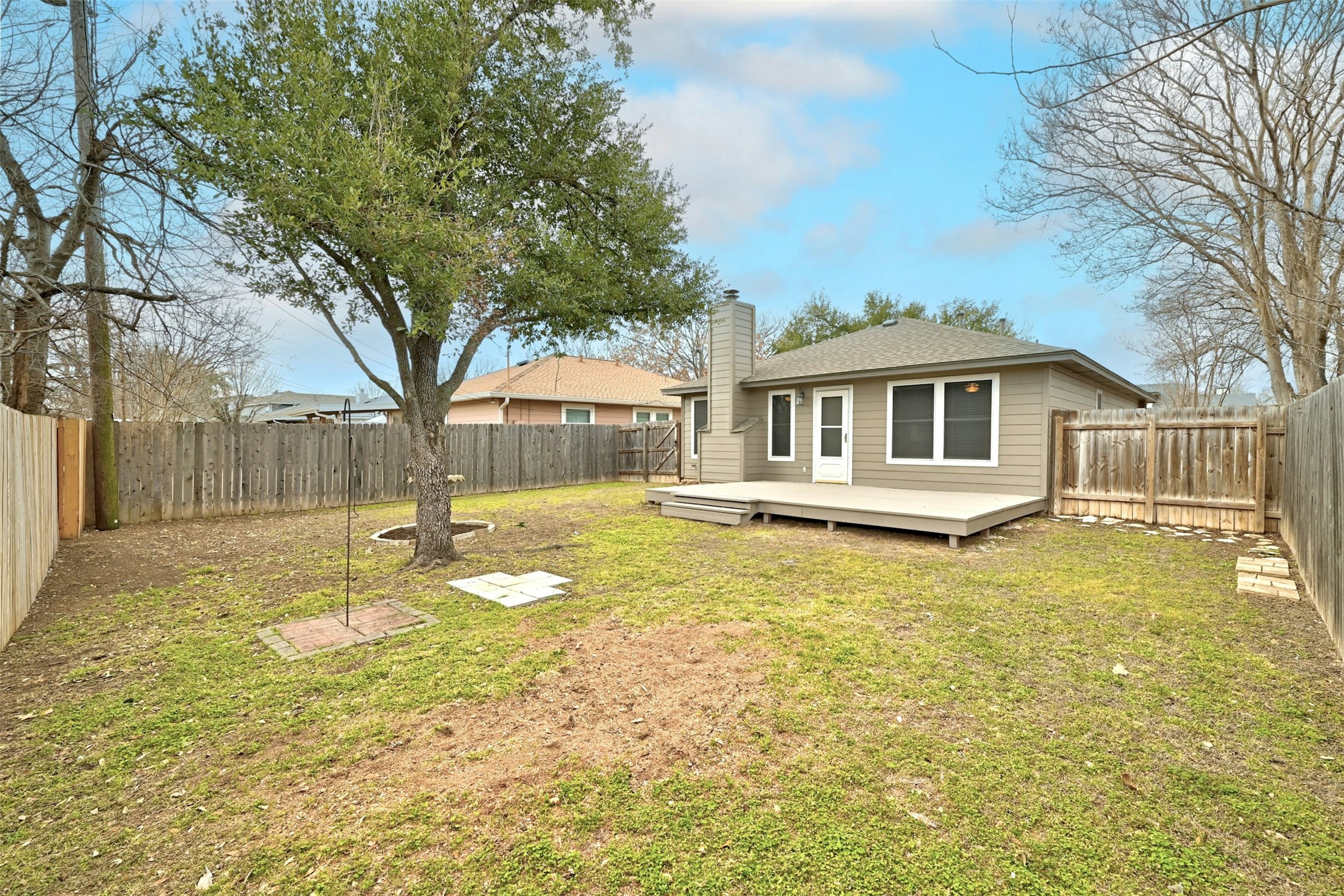 1807 Hollow Tree Boulevard Round Rock, TX 78681 - Photo 33 of 40 a swimming pool with trees in the background