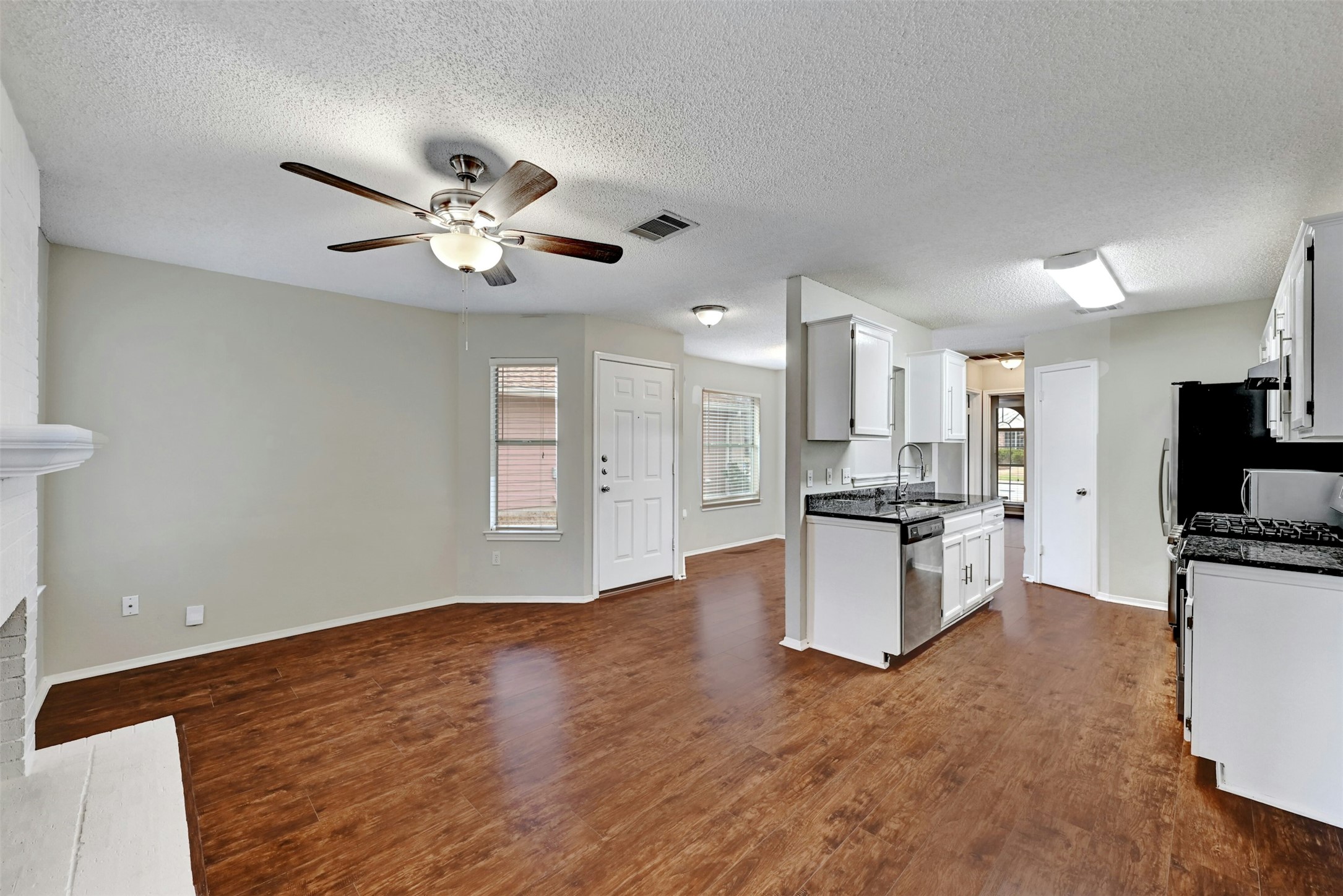 1807 Hollow Tree Boulevard Round Rock, TX 78681 - Photo 10 of 40 a view of a kitchen with a sink and a kitchen