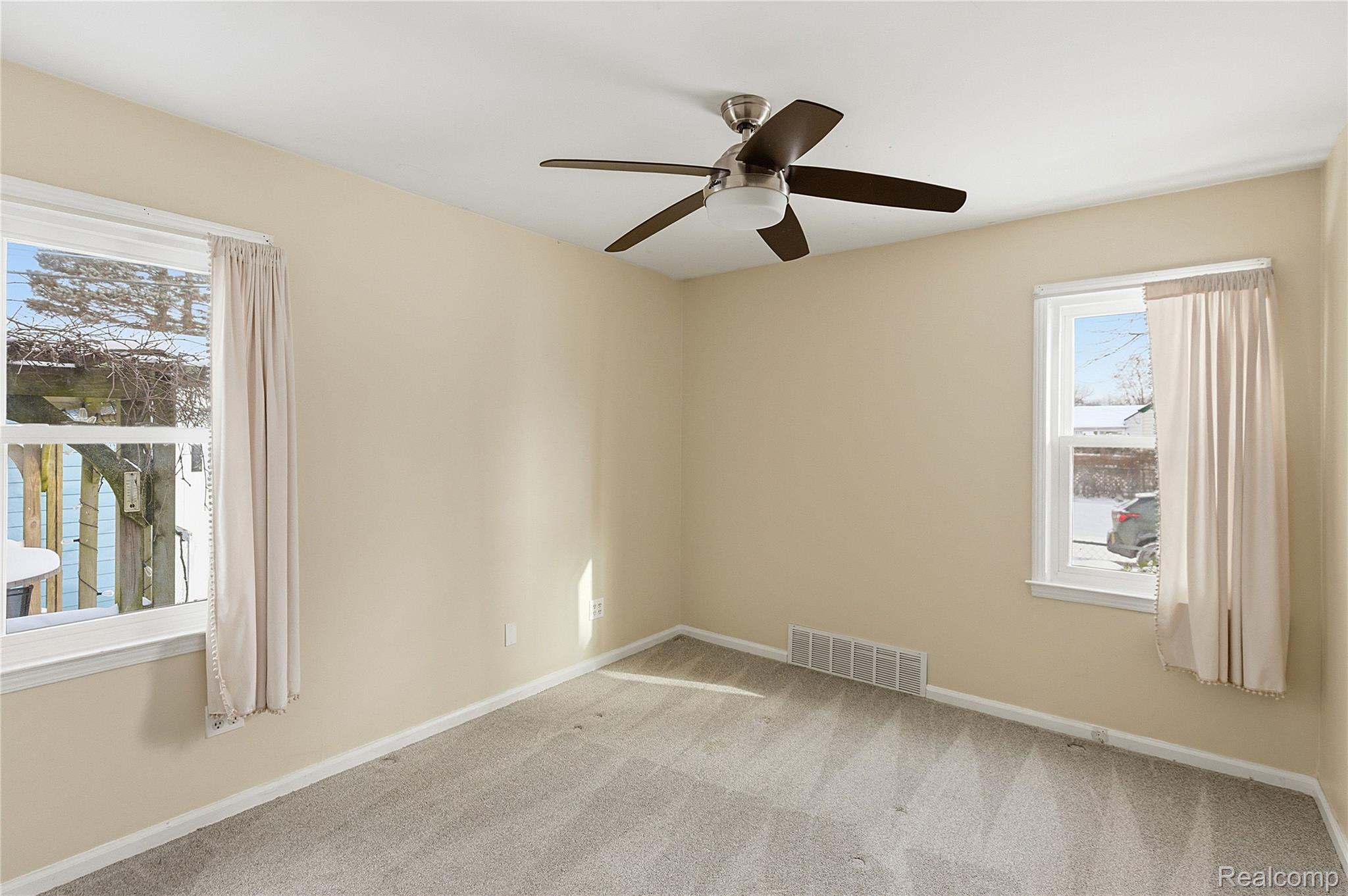26104 Student Street Redford, MI 48239 - Photo 15 of 30 Unfurnished room with carpet and ceiling fan