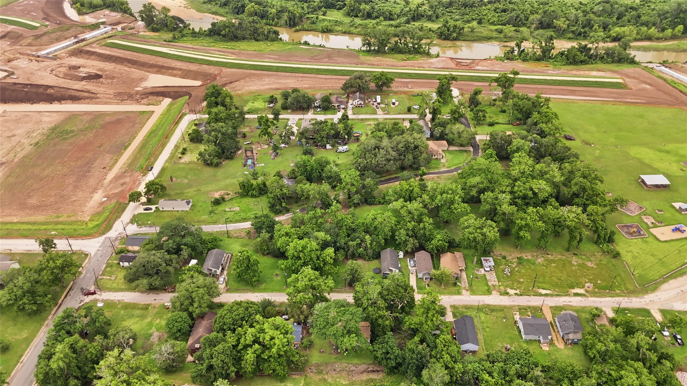 101 Outlar Street Wharton, TX 77488 - Photo 27 of 40 an aerial view of residential houses with outdoor space and street view