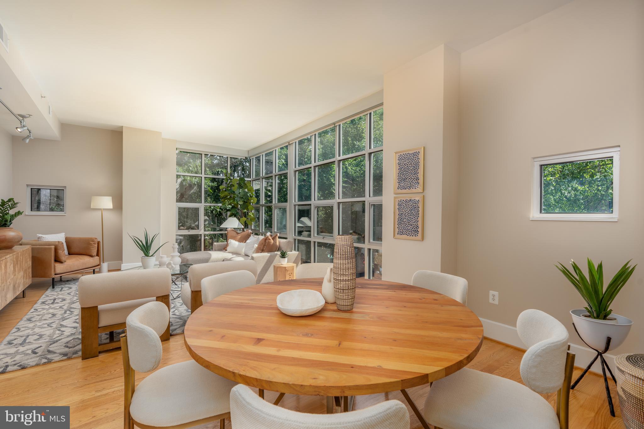 2100 11th Street Northwest, Unit 201 Washington, DC 20001 - Photo 11 of 38 a view of a dining room with furniture window and outside view