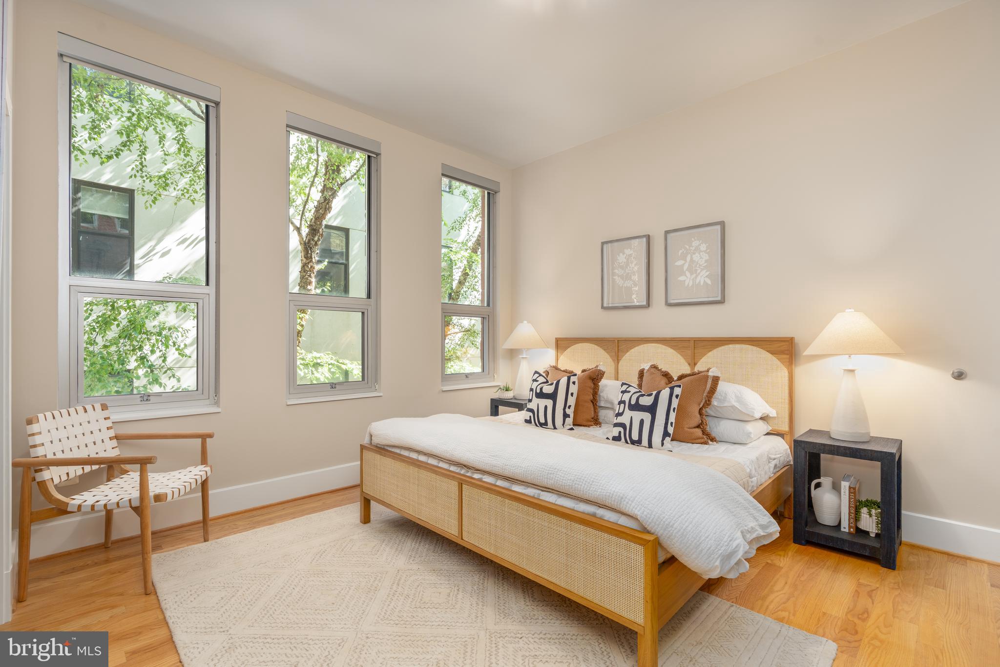 2100 11th Street Northwest, Unit 201 Washington, DC 20001 - Photo 23 of 38 a spacious bedroom with a bed and a window