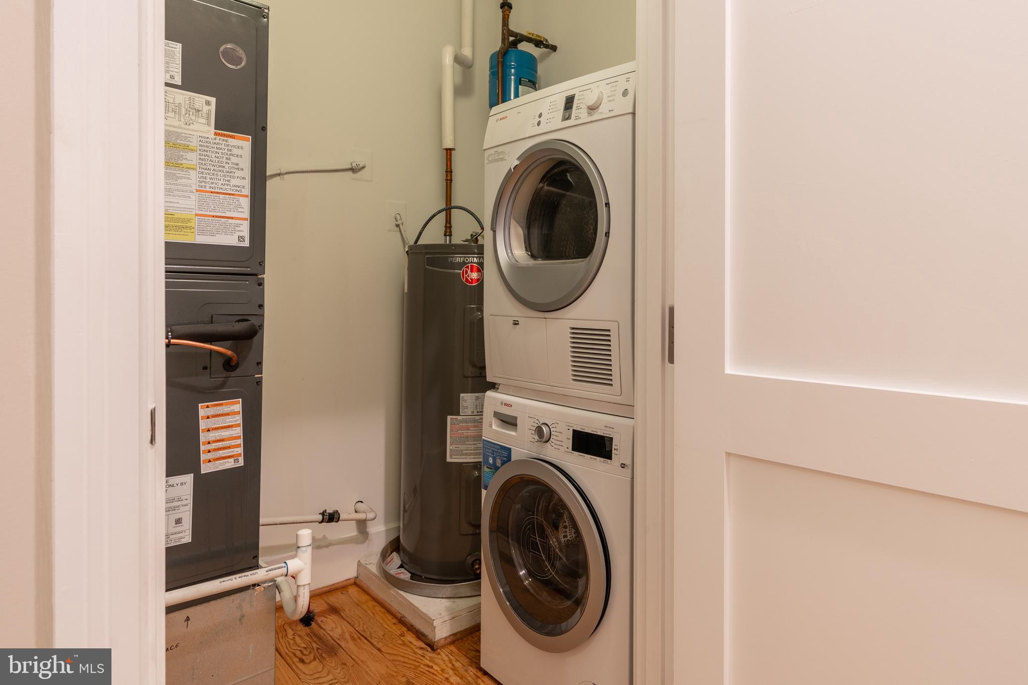 2100 11th Street Northwest, Unit 201 Washington, DC 20001 - Photo 30 of 38 a utility room with dryer and washer