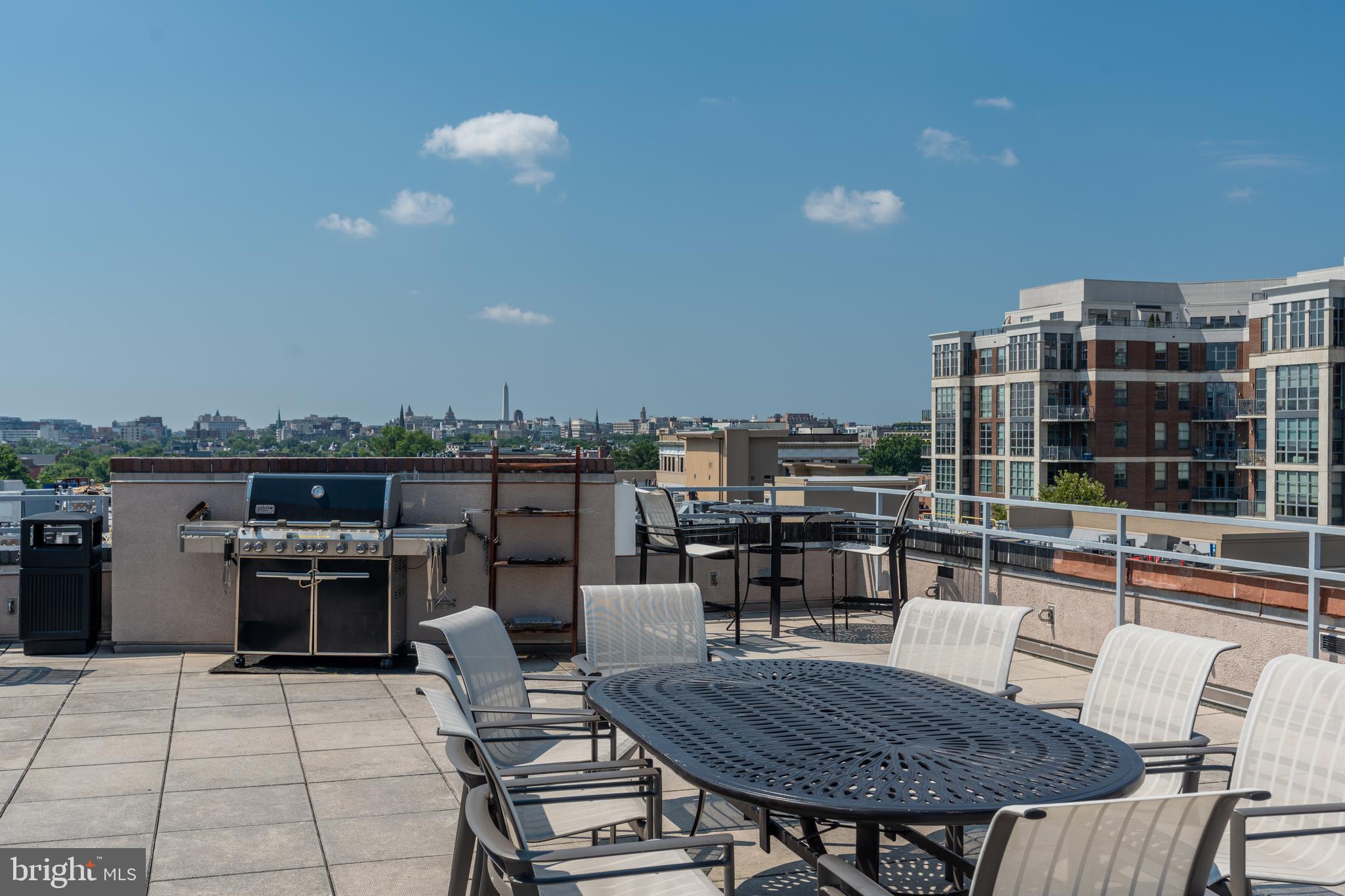 2100 11th Street Northwest, Unit 201 Washington, DC 20001 - Photo 36 of 38 a dinning table and chairs in the terrace