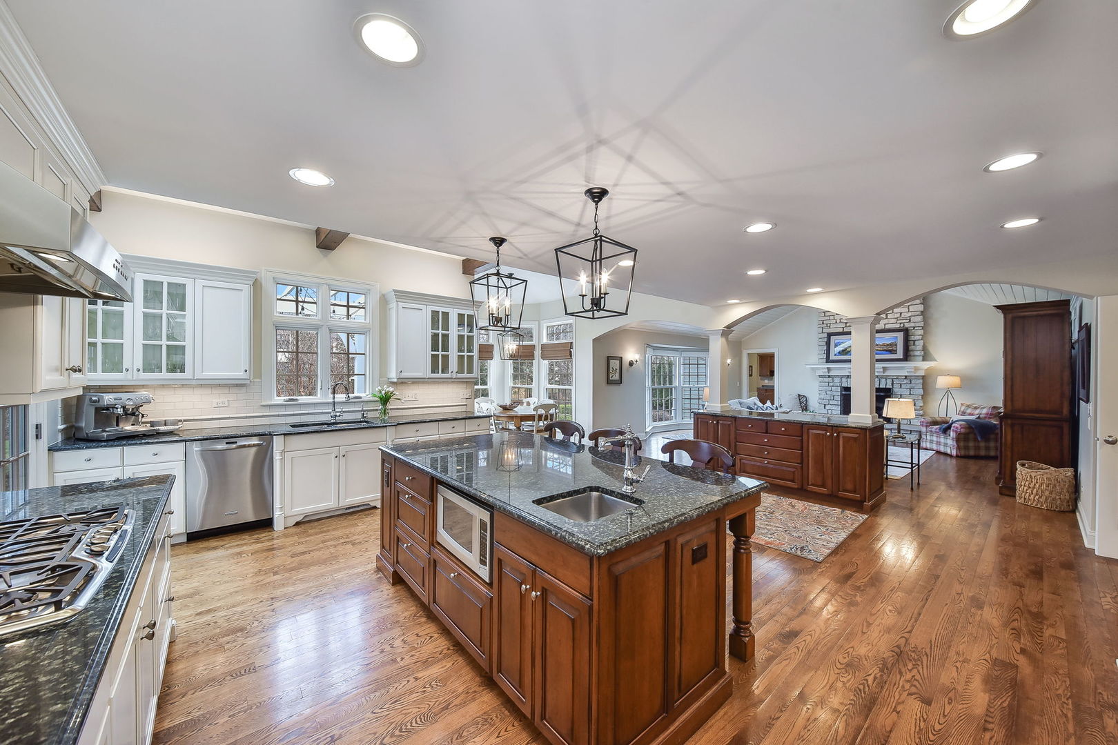1211 Sunset Road Geneva, IL 60134 - Photo 15 of 65 a kitchen with stainless steel appliances granite countertop a stove and a refrigerator