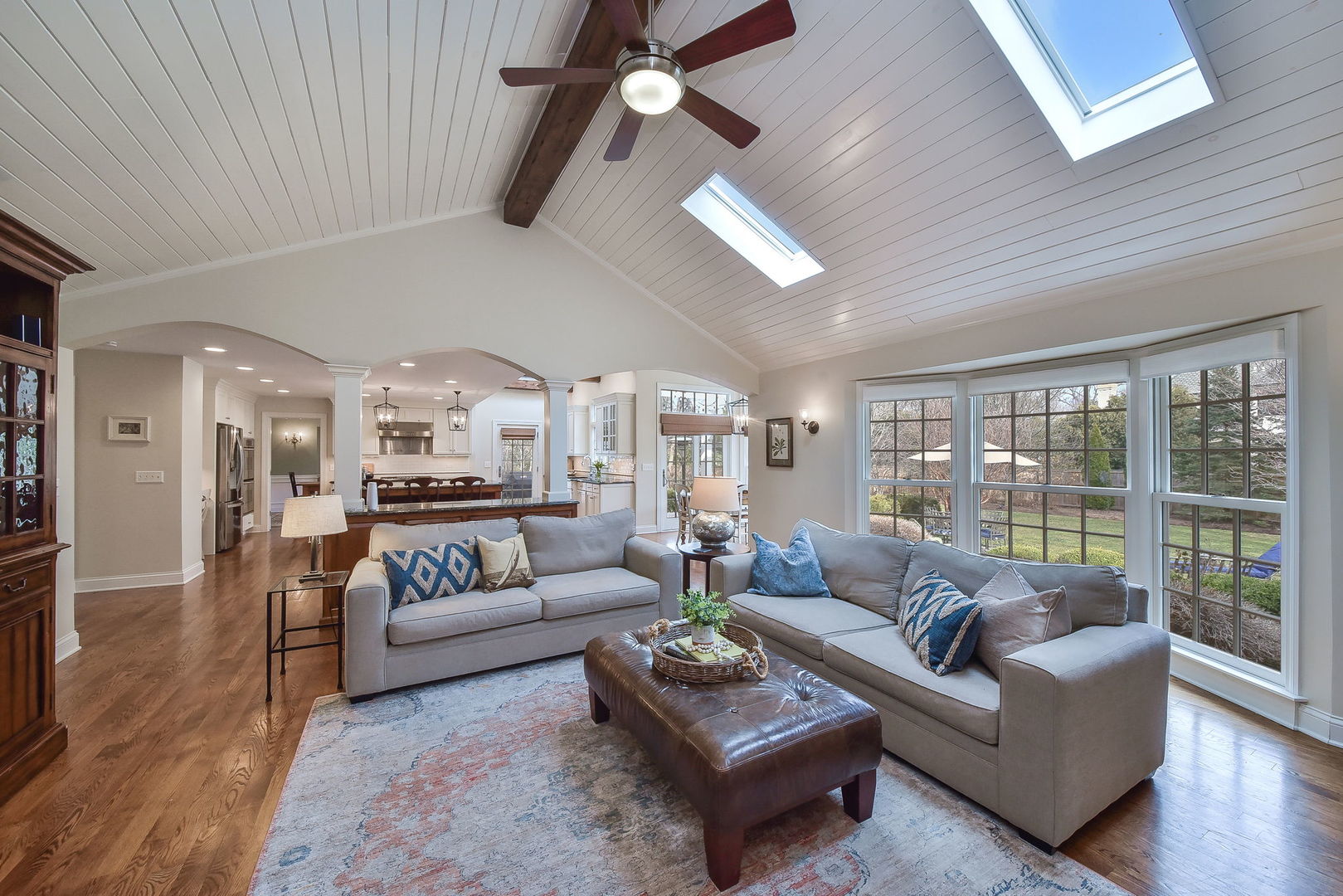 1211 Sunset Road Geneva, IL 60134 - Photo 24 of 65 a living room with furniture ceiling fan and a large window