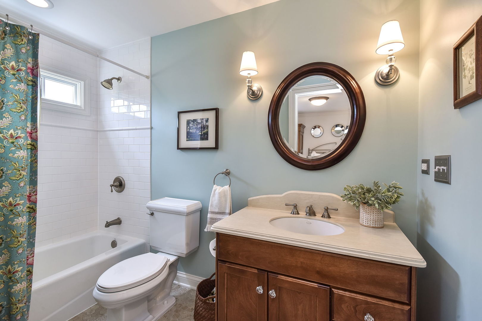 1211 Sunset Road Geneva, IL 60134 - Photo 30 of 65 a bathroom with a toilet a sink and a mirror