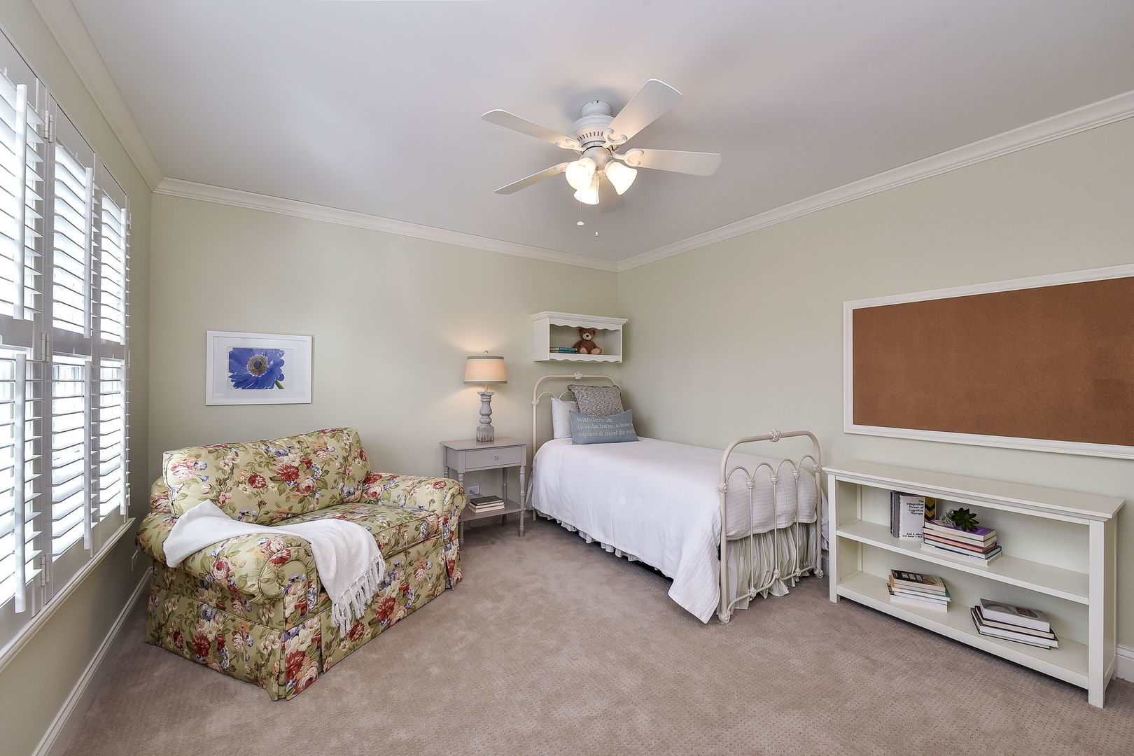 1211 Sunset Road Geneva, IL 60134 - Photo 36 of 65 a spacious bedroom with a bed and a chandelier