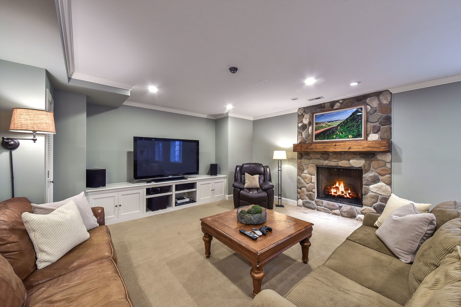1211 Sunset Road Geneva, IL 60134 - Photo 48 of 65 a living room with furniture and a flat screen tv