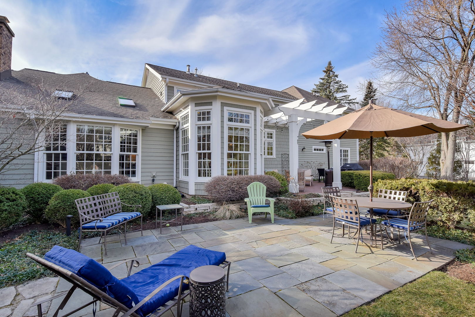 1211 Sunset Road Geneva, IL 60134 - Photo 54 of 65 a backyard of a house with table and chairs