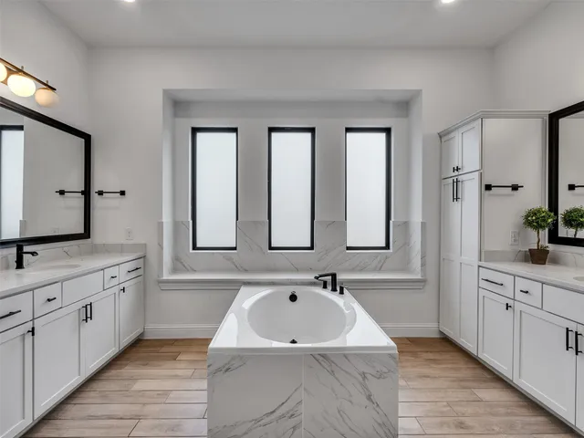 a view of a hallway with a staircase