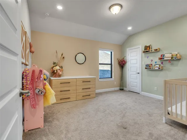 a bathroom with a double vanity sink mirror and shower