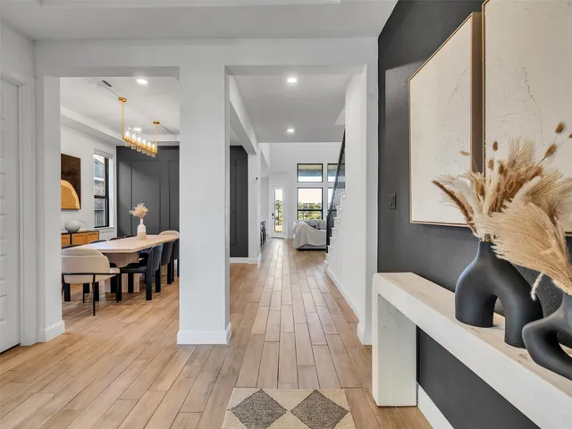 a view of a living room and dining room