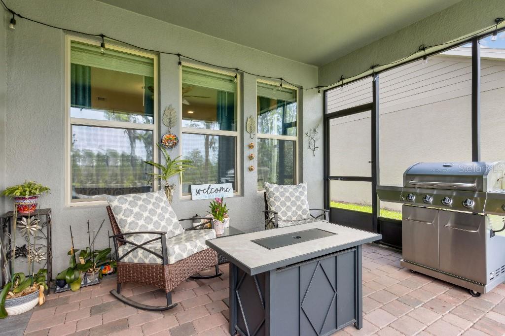 17936 Adrift Road Winter Garden, FL 34787 - Photo 31 of 44 a kitchen with a stove a sink and a refrigerator
