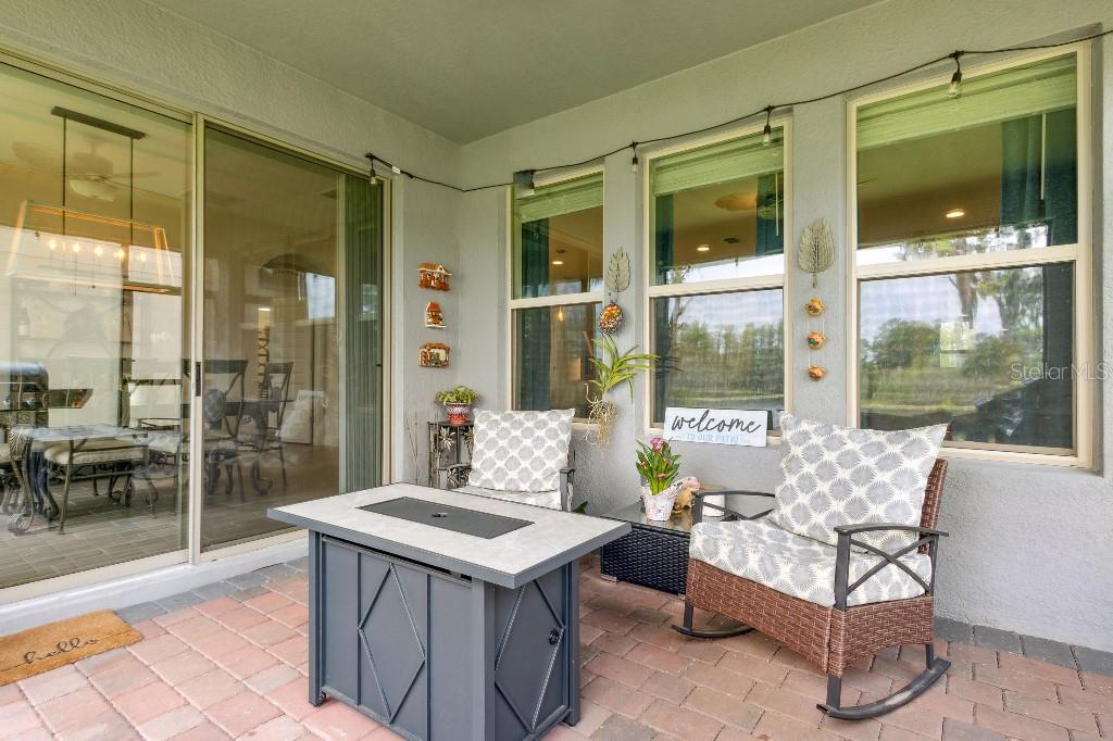 17936 Adrift Road Winter Garden, FL 34787 - Photo 32 of 44 a living room with furniture and a large window