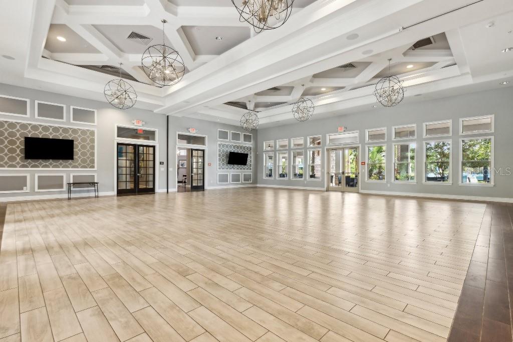 17936 Adrift Road Winter Garden, FL 34787 - Photo 39 of 44 a view of a room with wooden floors and fireplace