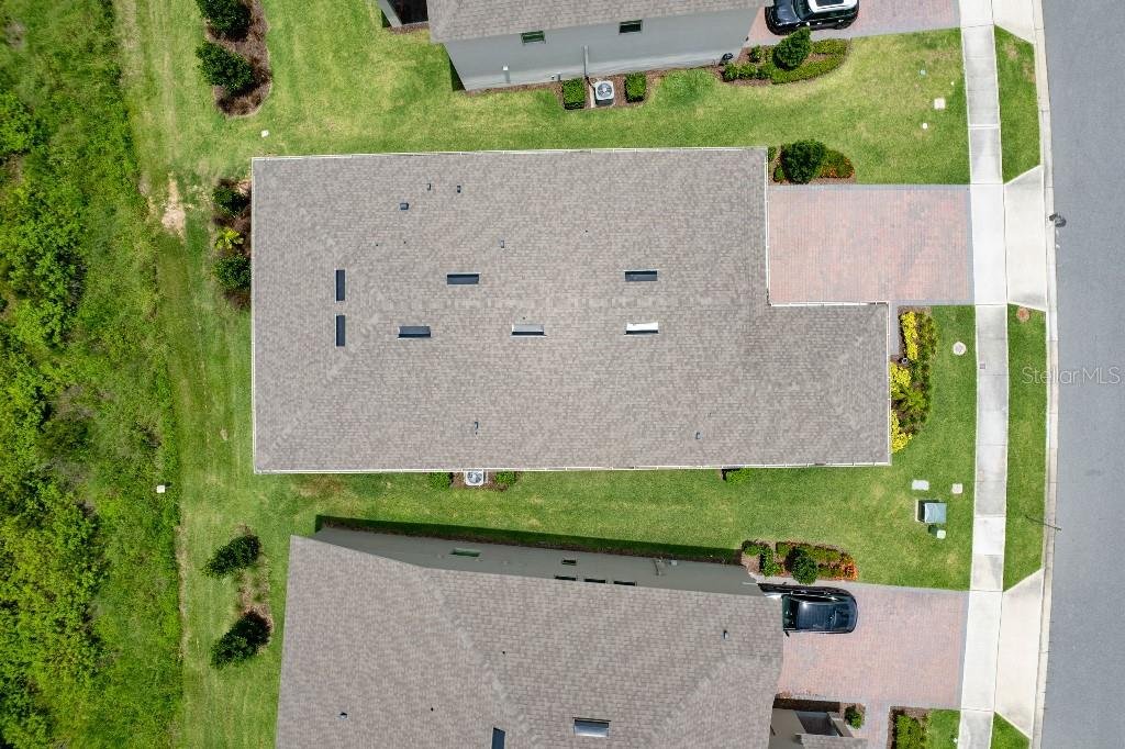 17936 Adrift Road Winter Garden, FL 34787 - Photo 5 of 44 an aerial view of a house with a yard
