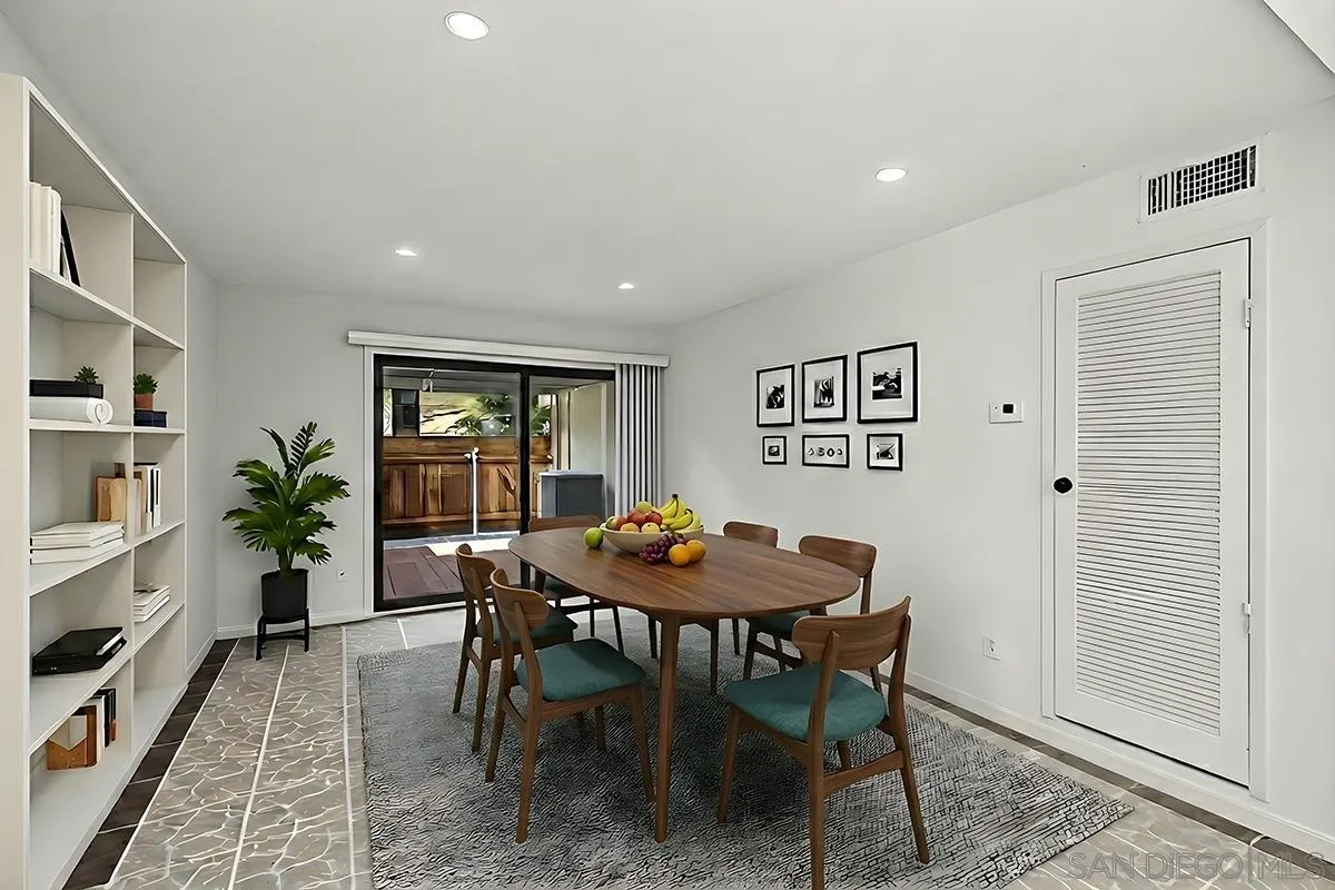 9787 Rimpark Way San Diego, CA 92124 - Photo 14 of 54 a dining room with furniture and window