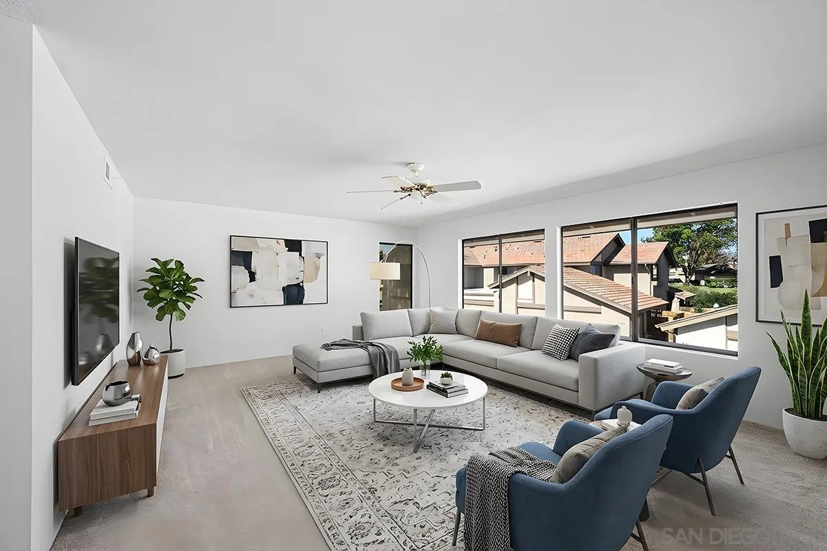 9787 Rimpark Way San Diego, CA 92124 - Photo 28 of 54 a living room with furniture and a flat screen tv