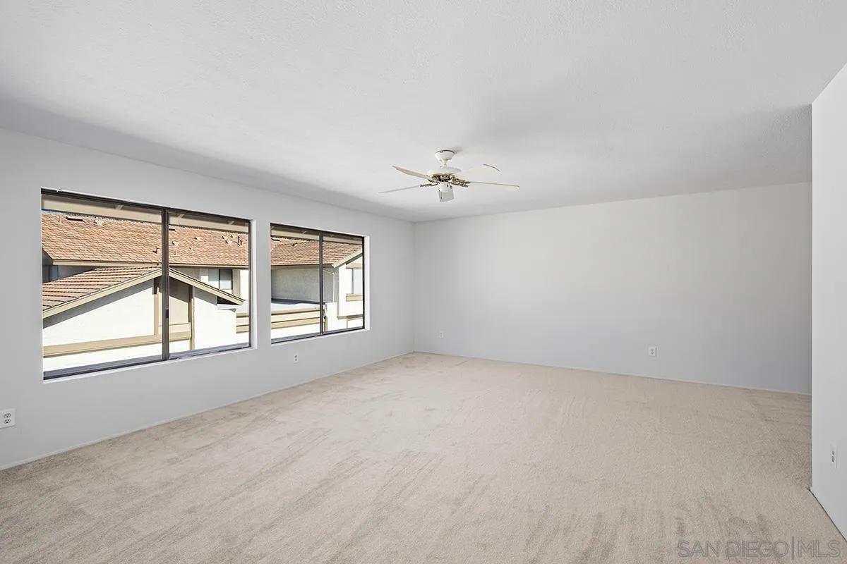 9787 Rimpark Way San Diego, CA 92124 - Photo 30 of 54 an empty room with a window