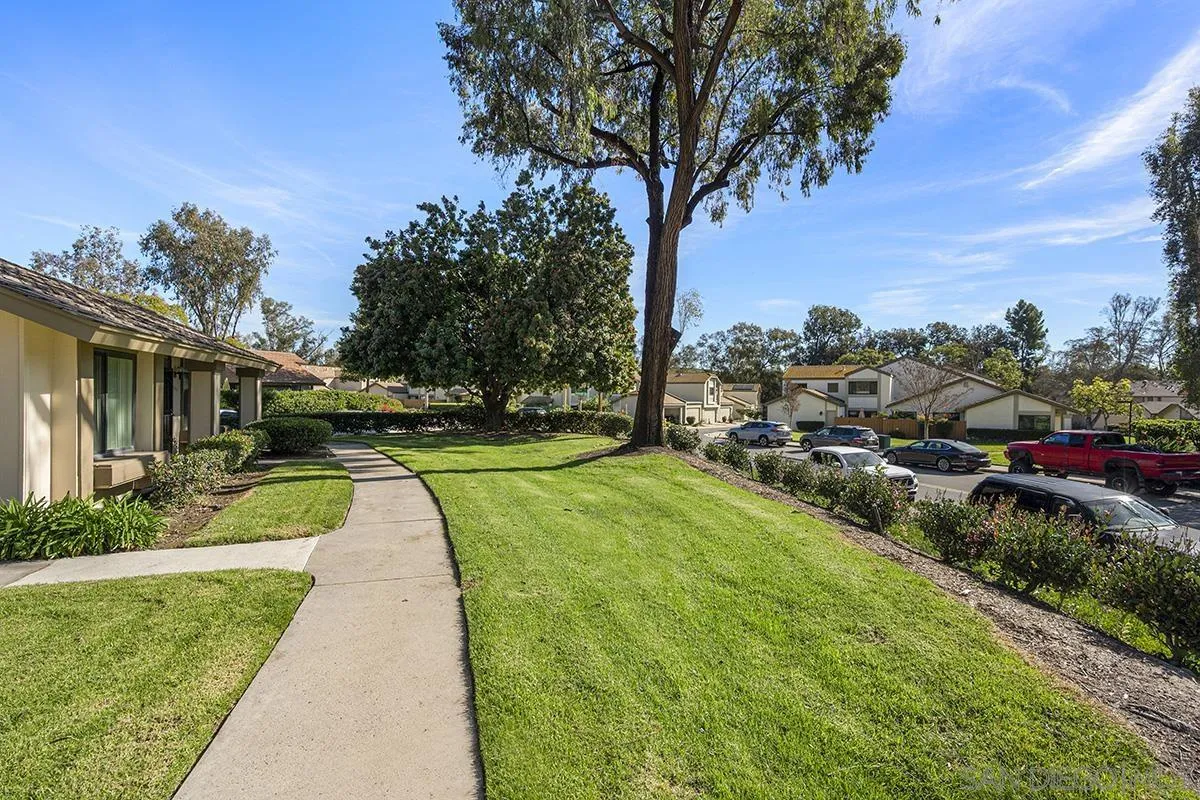 9787 Rimpark Way San Diego, CA 92124 - Photo 39 of 54 a view of a house with a yard