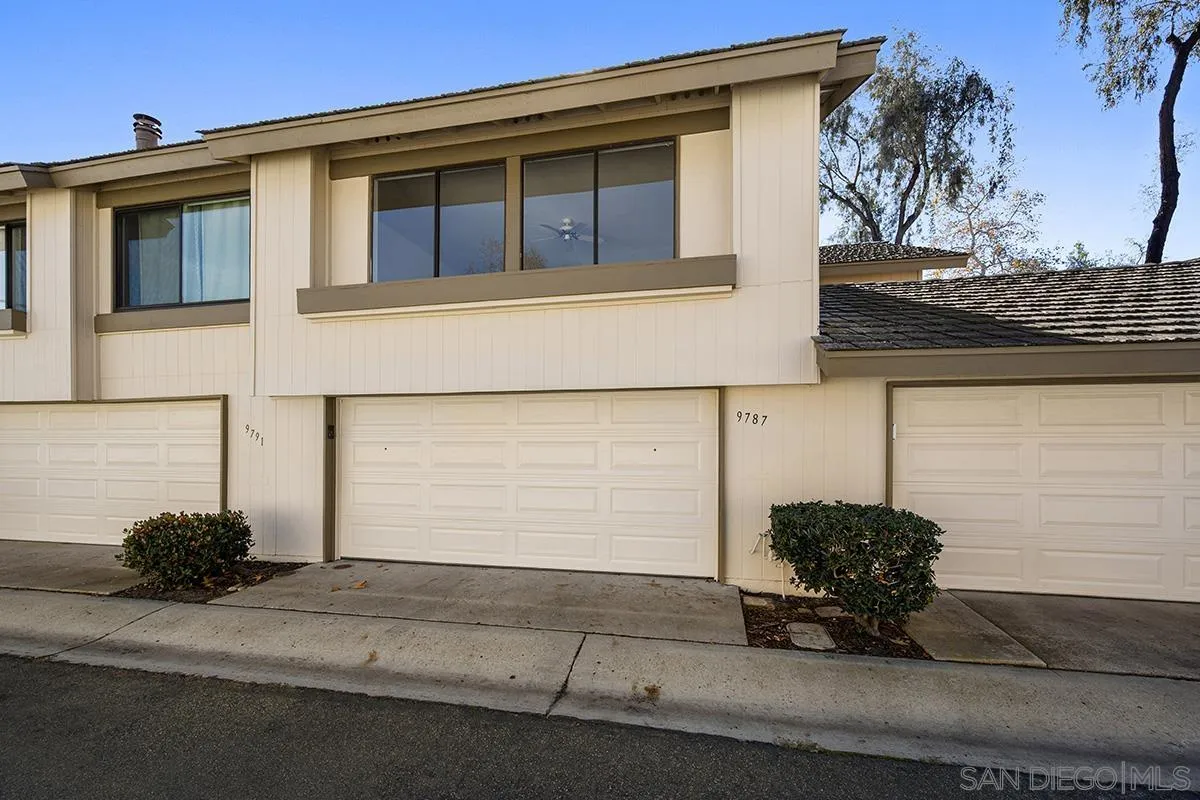9787 Rimpark Way San Diego, CA 92124 - Photo 45 of 54 a small white house with a outdoor space