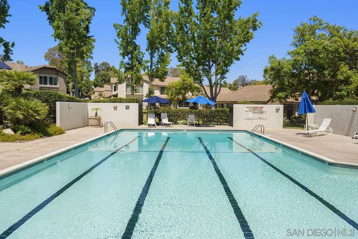 9787 Rimpark Way San Diego, CA 92124 - Photo 48 of 54 a balcony with view of trees