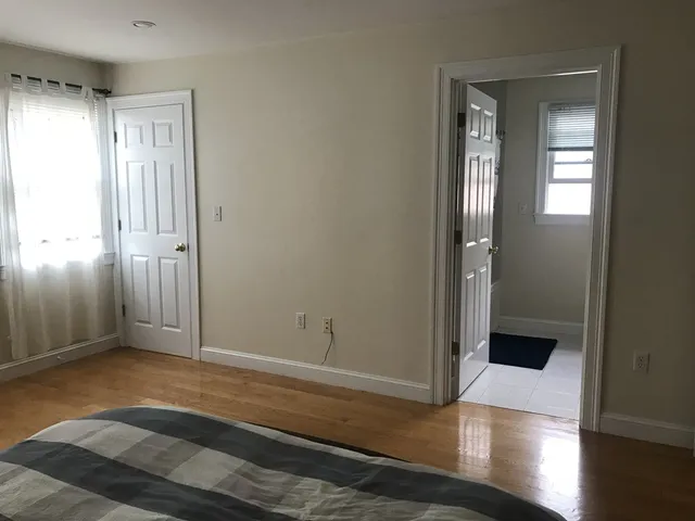 a view of entryway with wooden floor