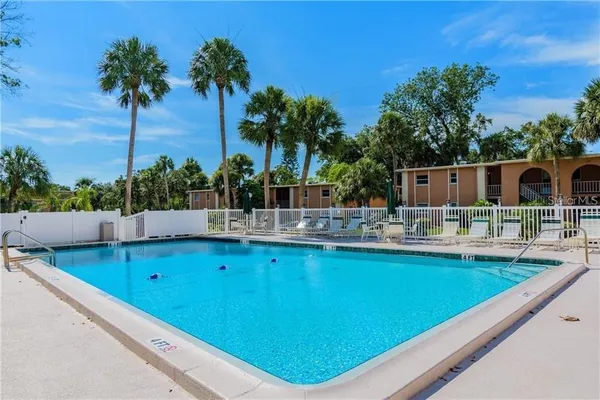 a view of swimming pool with a patio