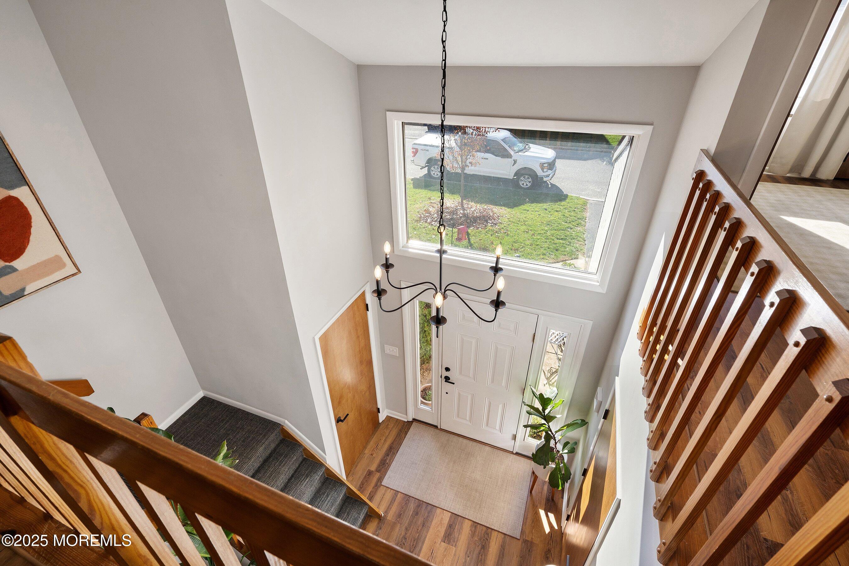 51 White Swan Way Brick, NJ 08723 - Photo 12 of 21 a view of an entryway with wooden floor