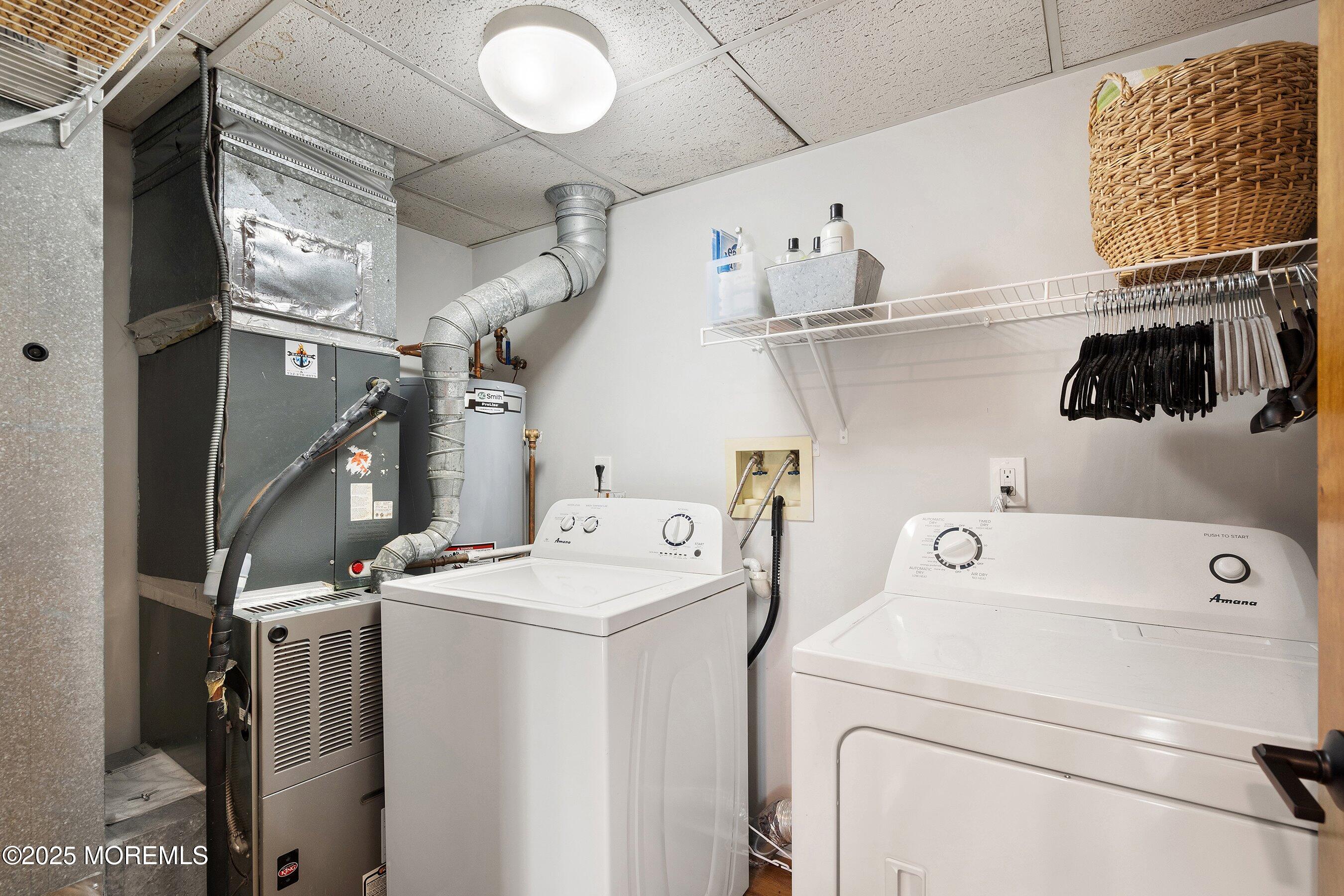 51 White Swan Way Brick, NJ 08723 - Photo 18 of 21 a utility room with dryer and washer