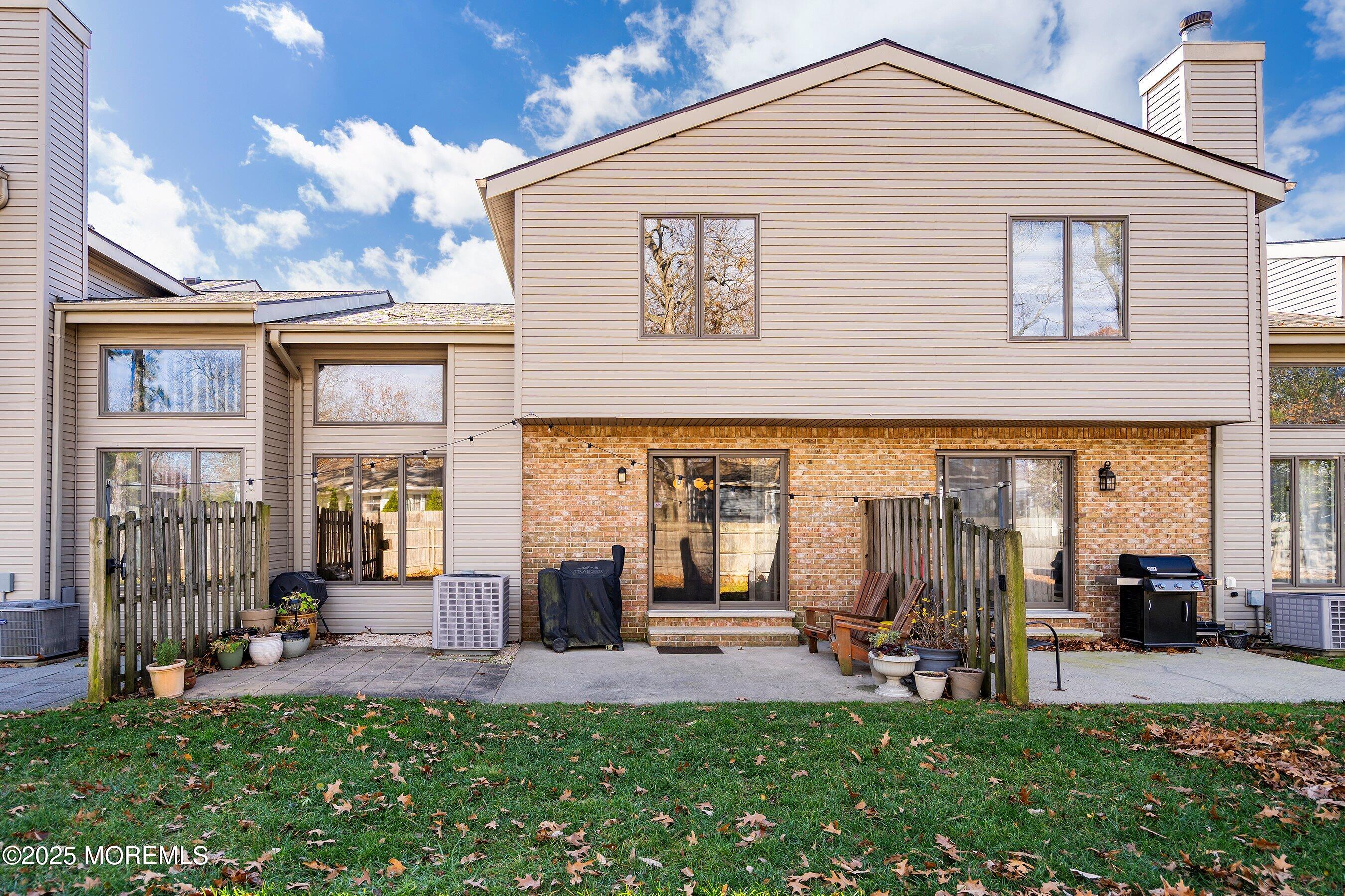 51 White Swan Way Brick, NJ 08723 - Photo 19 of 21 a view of a house with patio