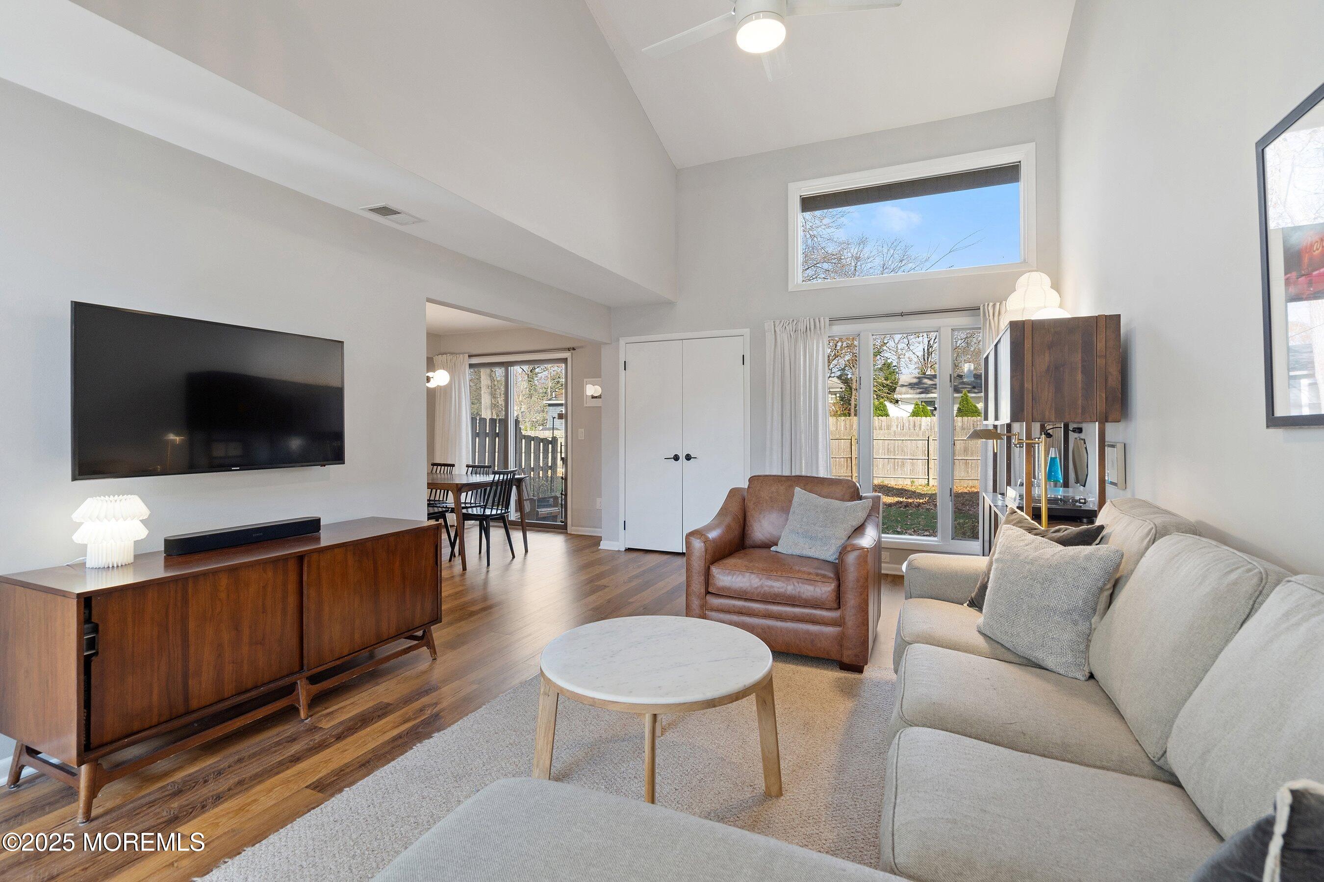 51 White Swan Way Brick, NJ 08723 - Photo 5 of 21 a living room with furniture and a flat screen tv