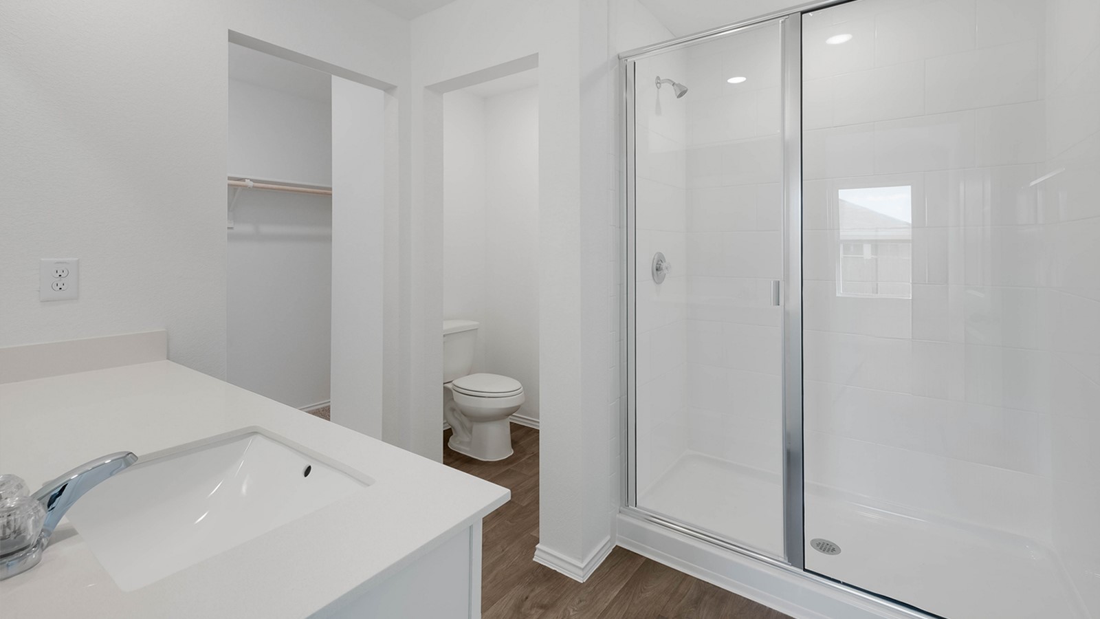 12205 Pike Bend Mustang Ridge, TX 78610 - Photo 13 of 19 a bathroom with a sink a toilet and shower