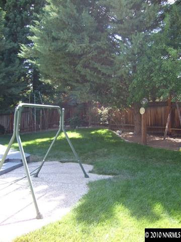 4865 Warren Way Reno, NV 89509 - Photo 9 of 9 a view of a backyard with a slide