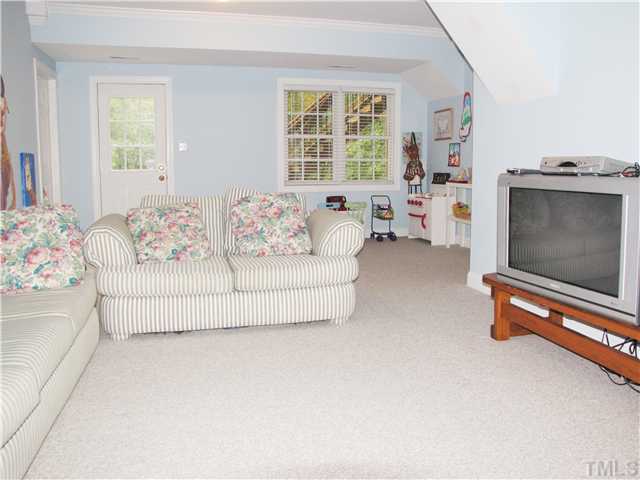 1512 Patterson Grove Road Apex, NC 27502 - Photo 20 of 25 What a great walk-out Recreation Room. There is a 16 x 9.5 concrete patio outside the doorway.