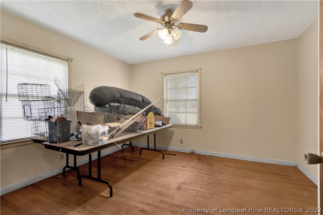 7400 East Raynham Road Fairmont, NC 28340 - Photo 15 of 21 a room with furniture and a window