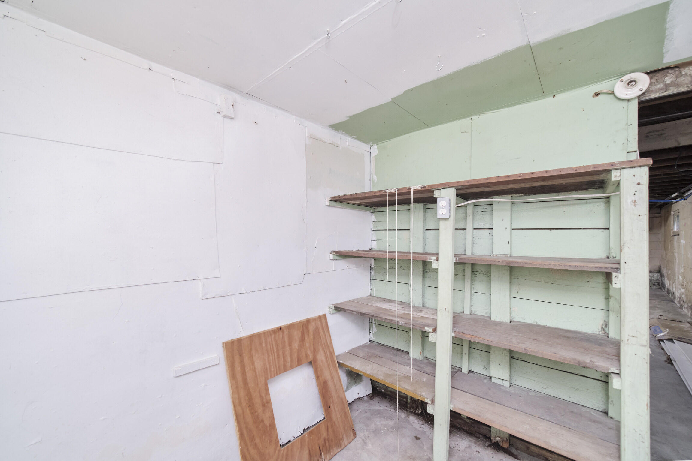 711 Ramsdell Street Manistee, MI 49660 - Photo 29 of 34 Basement storage