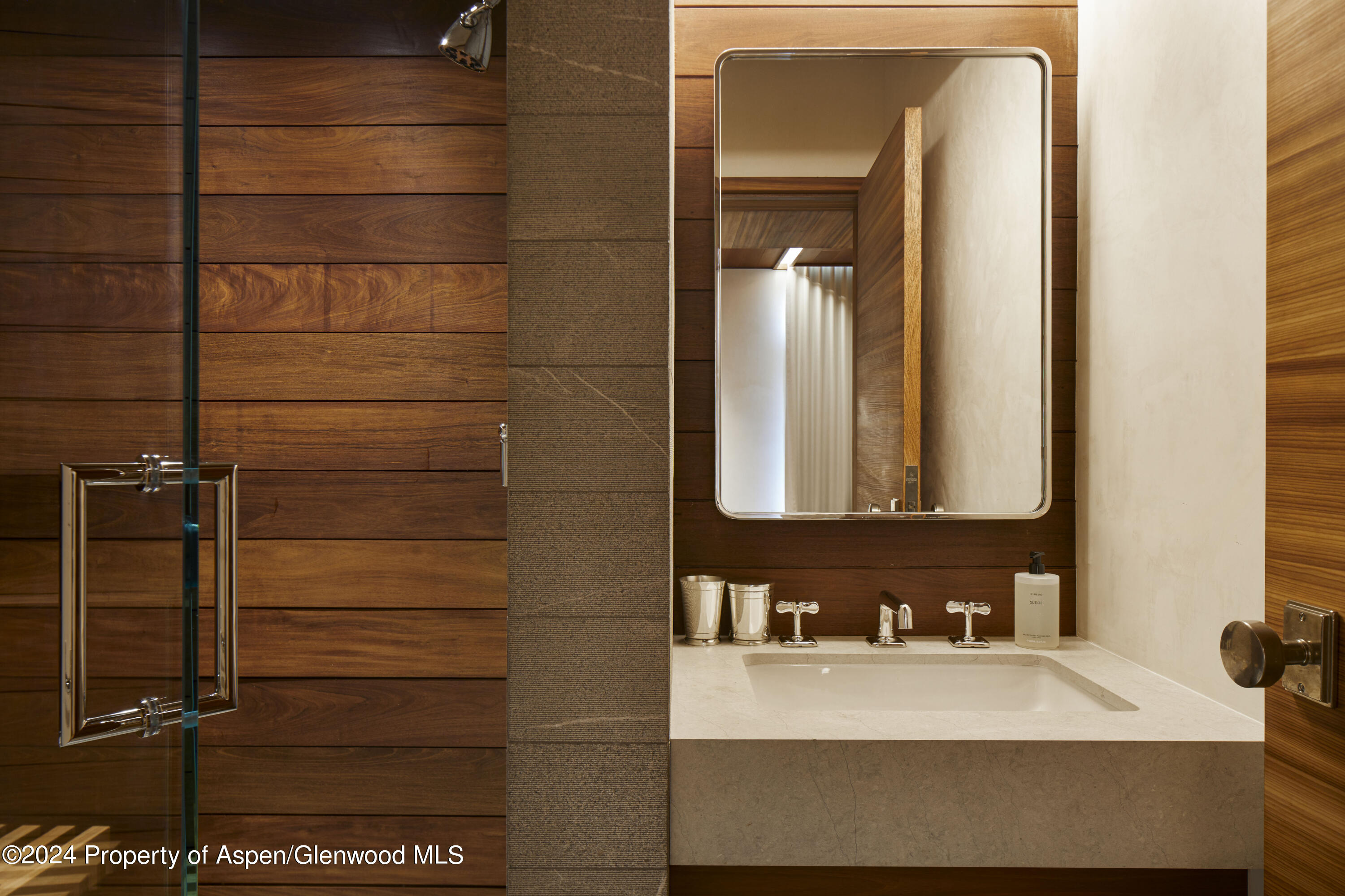 255 Conundrum Creek Road Aspen, CO 81611 - Photo 11 of 21 a bathroom with a sink and a mirror