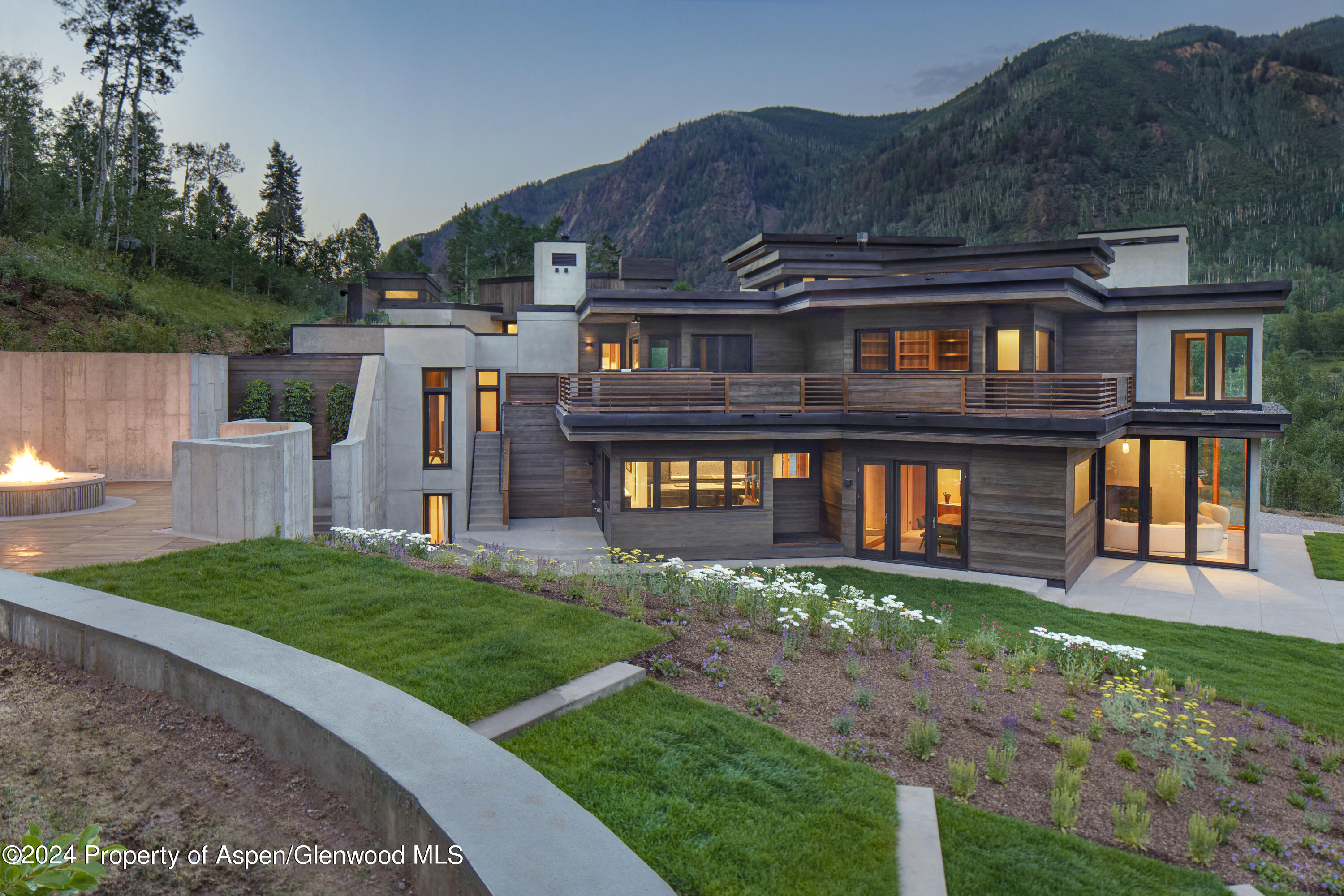 255 Conundrum Creek Road Aspen, CO 81611 - Photo 14 of 21 a front view of a house with a yard and lake view