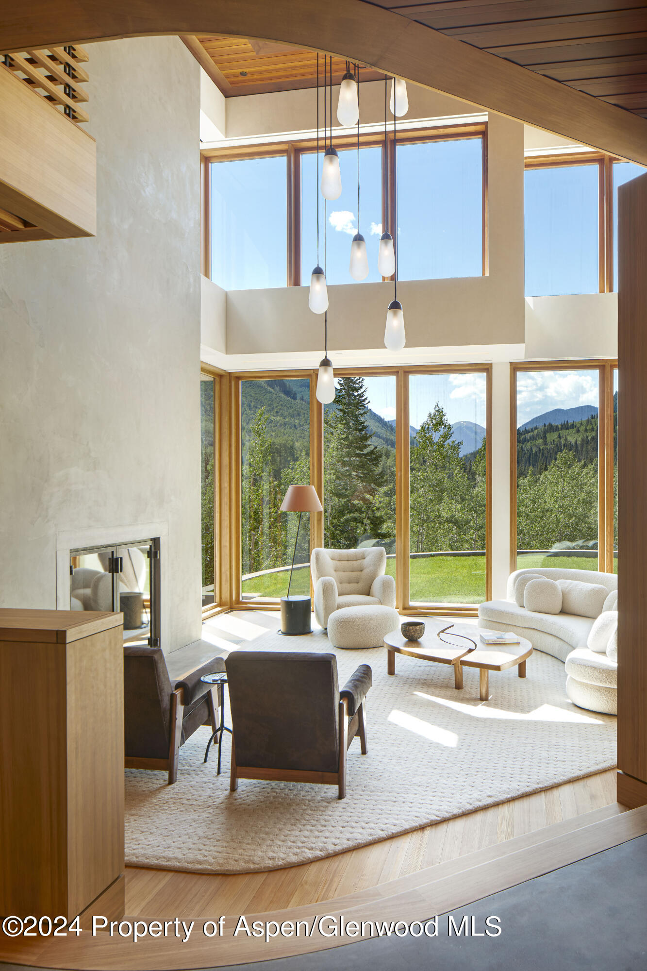 255 Conundrum Creek Road Aspen, CO 81611 - Photo 3 of 21 a view of a living room and kitchen with furniture