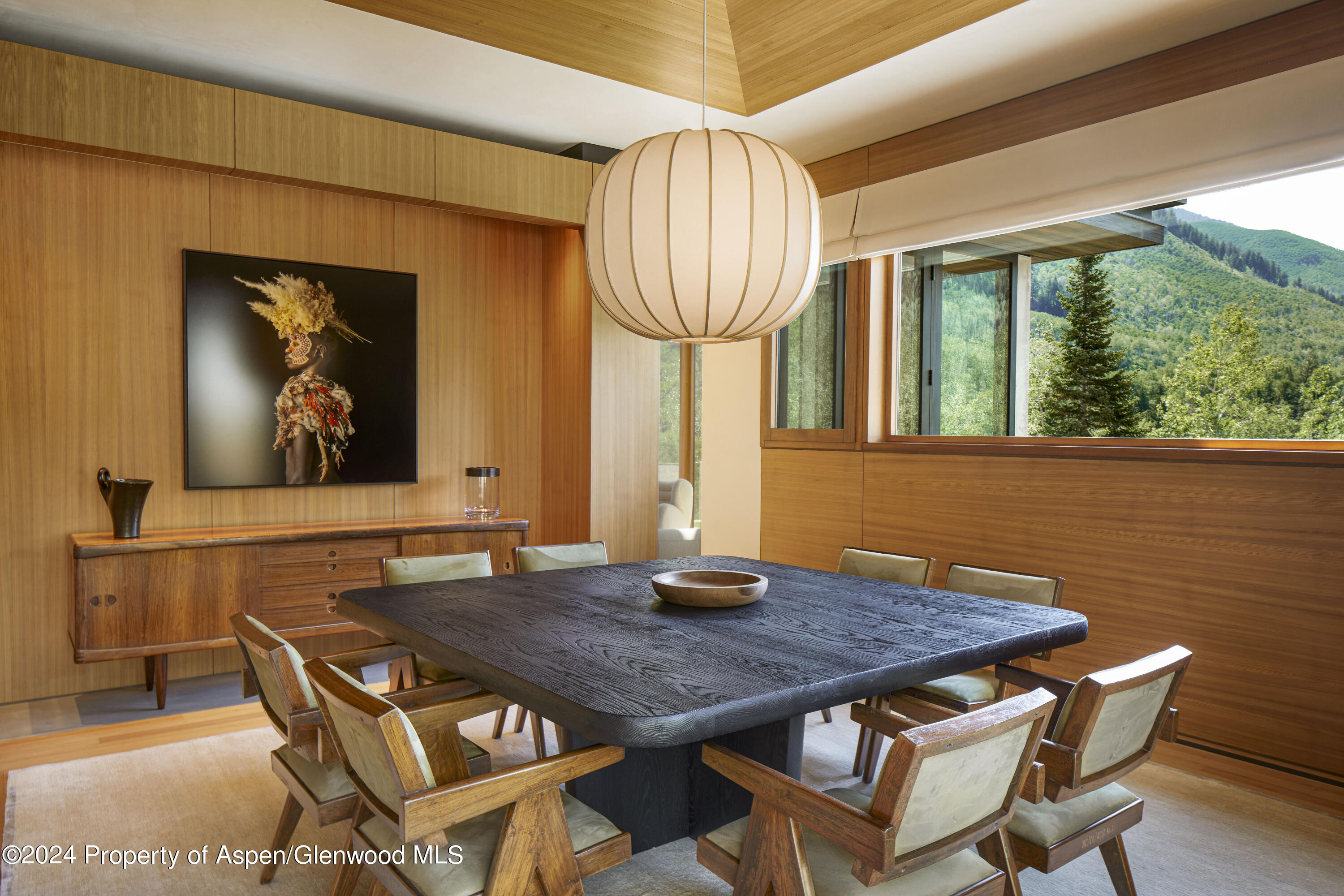255 Conundrum Creek Road Aspen, CO 81611 - Photo 4 of 21 a view of a dining room with furniture window and wooden floor