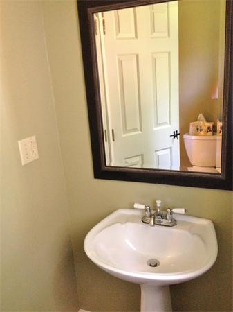 14 Johnson Road Sterling, MA 01564 - Photo 11 of 22 a bathroom with a sink and a mirror