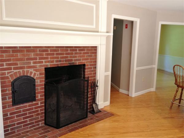14 Johnson Road Sterling, MA 01564 - Photo 6 of 22 a living room with a fireplace in it