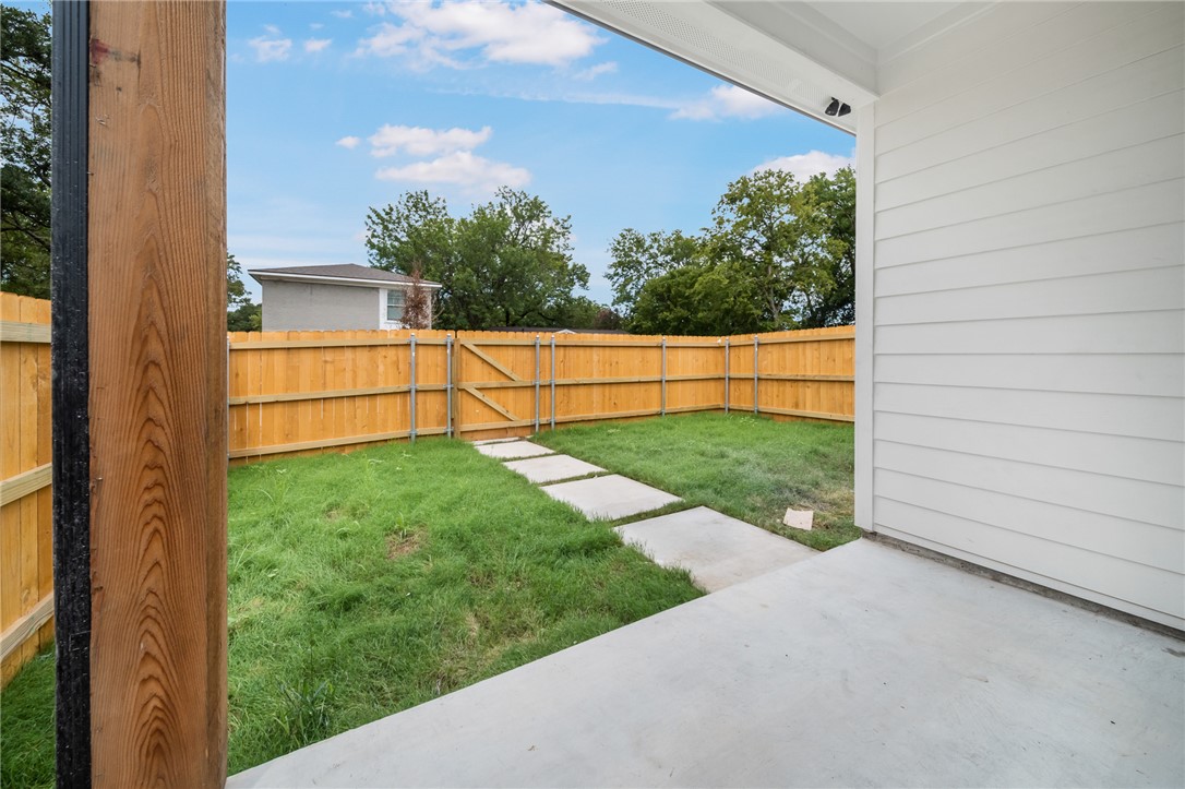 213 Lynn Drive, Unit 202 Bryan, TX 77801 - Photo 20 of 28 a view of backyard with green space