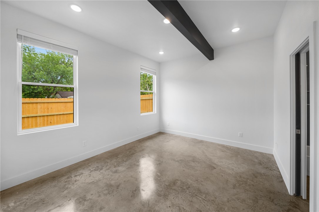 213 Lynn Drive, Unit 202 Bryan, TX 77801 - Photo 23 of 28 a view of an empty room with a window